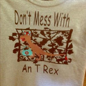 Dinosaur T shirt with a funny saying.
